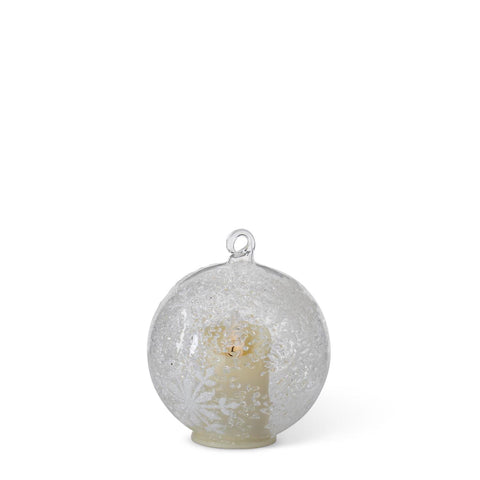 Light your holiday tree with these beautiful flickering candle ornaments!

The clear glass ornament holds an LED candle that casts a flickering warm glow through the icy textured glass which is accented with a frosty white snowflake design.