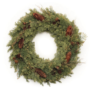 Beautiful 24 inch mixed faux evergreen Christmas holiday  wreath   featuring a mix of juniper and cedar foliage accented by natural long pinecones and small twigs for added textural interest.