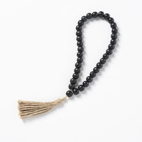 Black Wood Bead Loop Garland with Jute Tassel, 14 1/2 in. L