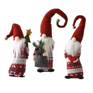 Fun trio of tall skinny gnomes dressed in red and white holiday sweaters and red poity hats with jingle bells bearing gifts.